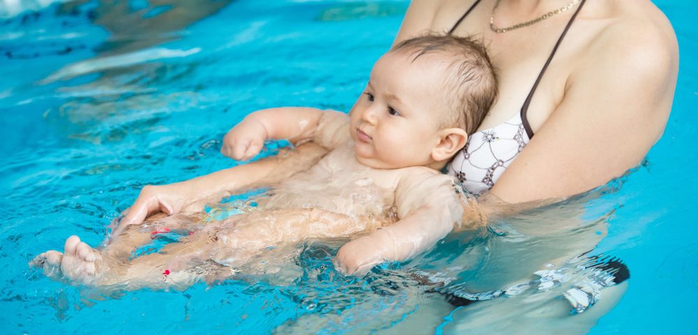 newborn baby swimming